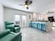 Kitchen with teal barstools and French doors at 4001 Beneva Rd # 409, Sarasota, FL 34233