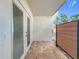 Private patio with tile flooring and privacy fence at 4001 Beneva Rd # 409, Sarasota, FL 34233