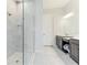 Spa-like bathroom with double vanity and large walk-in shower at 4707 Arpino Ct, Bradenton, FL 34211