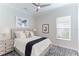 Bright bedroom featuring a comfortable bed and tasteful decor at 4707 Arpino Ct, Bradenton, FL 34211