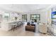 Open concept kitchen and living room with modern finishes at 4707 Arpino Ct, Bradenton, FL 34211