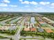 Aerial view of house and community at 4905 Avila Lakes Dr, Wimauma, FL 33598