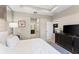 Luxurious main bedroom with a king-size bed and an ensuite bathroom at 4905 Avila Lakes Dr, Wimauma, FL 33598