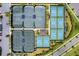 Aerial view of community pickleball courts at 4905 Avila Lakes Dr, Wimauma, FL 33598