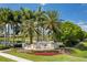 Waterlefe Golf and River Club entrance with lush landscaping at 608 Misty Pond Ct, Bradenton, FL 34212