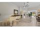 Open concept living area with views into kitchen and dining area at 608 Misty Pond Ct, Bradenton, FL 34212