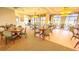 Elegant restaurant with set tables and scenic views at 608 Misty Pond Ct, Bradenton, FL 34212