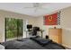 Bedroom with a queen-size bed, dresser, and home office space at 6462 Wild Oak Bay Blvd # 247, Bradenton, FL 34210
