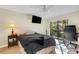 Cozy bedroom with a queen-size bed and private balcony access at 6462 Wild Oak Bay Blvd # 247, Bradenton, FL 34210