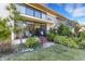 Well maintained exterior with lush landscaping and private patio at 6462 Wild Oak Bay Blvd # 247, Bradenton, FL 34210