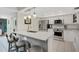 Modern kitchen with stainless steel appliances and island at 6462 Wild Oak Bay Blvd # 247, Bradenton, FL 34210