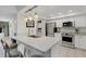 Modern kitchen with stainless steel appliances and breakfast bar at 6462 Wild Oak Bay Blvd # 247, Bradenton, FL 34210