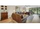 Spacious living room with leather sofas and wood flooring at 6462 Wild Oak Bay Blvd # 247, Bradenton, FL 34210