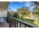 Private patio with lush landscaping and access to stairs at 6462 Wild Oak Bay Blvd # 247, Bradenton, FL 34210