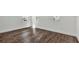 Bedroom with wood floors, white walls, and three windows offering plenty of natural light at 8007 Nevis Run, Bradenton, FL 34202