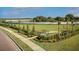 Dog park entrance with signage and landscaping at 8007 Nevis Run, Bradenton, FL 34202