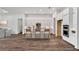 Modern kitchen featuring white cabinets, an island, and stainless steel appliances at 8007 Nevis Run, Bradenton, FL 34202