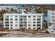 Aerial showcasing beachfront building at 1100 Tarpon Center Dr # 5B, Venice, FL 34285