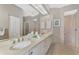 Spacious bathroom with dual vanities, ample counter space, and a walk-in shower at 114 Fieldstone Dr, Venice, FL 34292