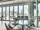 Clubhouse interior featuring comfortable seating with golf course views at 114 Fieldstone Dr, Venice, FL 34292