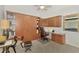 Home office/den with built-in desk, shelving, and murphy bed for added versatility at 114 Fieldstone Dr, Venice, FL 34292