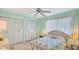Bedroom with double bed and built-in closets at 1305 Glen Oaks E Dr # 130, Sarasota, FL 34232