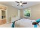 Bedroom with ceiling fan and dresser at 13534 5Th Ne Ave, Bradenton, FL 34212