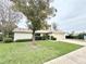 Charming single-story home featuring a well-maintained lawn and an attached one car garage at 1416 Glenmere Dr, Brandon, FL 33511