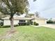 Charming single-story home featuring a well-maintained lawn and an attached one car garage at 1416 Glenmere Dr, Brandon, FL 33511