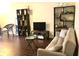Cozy living room featuring wood floors and comfortable seating at 209 Dragons Fire Pl, Valrico, FL 33594