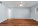 Bright bedroom with wood flooring and ceiling fan at 2522 Clubhouse Dr # 204, Sarasota, FL 34232