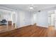 Spacious bedroom with wood flooring and mirrored closet doors at 2522 Clubhouse Dr # 204, Sarasota, FL 34232