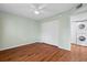 Light and bright bedroom with wood-look flooring and ample closet space at 2522 Clubhouse Dr # 204, Sarasota, FL 34232