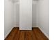 Closet with wood flooring and shelving at 2522 Clubhouse Dr # 204, Sarasota, FL 34232