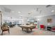 Community room with pool table and comfortable seating at 2522 Clubhouse Dr # 204, Sarasota, FL 34232