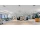 Large community room with multiple seating areas at 2522 Clubhouse Dr # 204, Sarasota, FL 34232