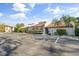 Community building with ample parking at 2522 Clubhouse Dr # 204, Sarasota, FL 34232