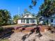House with backyard wooden deck and tropical landscaping at 2724 Ashton Rd, Sarasota, FL 34231