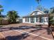 House with backyard wooden deck and tropical landscaping at 2724 Ashton Rd, Sarasota, FL 34231