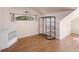 Bedroom with hardwood floors, built-in shelving, and a window seat at 2724 Ashton Rd, Sarasota, FL 34231