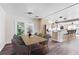 Bright, open kitchen with dining area and stainless steel appliances, perfect for modern living at 2724 Ashton Rd, Sarasota, FL 34231