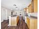 Kitchen with light wood cabinets and granite countertops at 2724 Ashton Rd, Sarasota, FL 34231