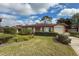 Single-story home with attached garage and well-manicured landscaping at 3001 Vivienda Blvd, Bradenton, FL 34207