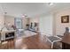 Bright living room featuring hardwood floors and a comfortable sitting area at 3001 Vivienda Blvd, Bradenton, FL 34207
