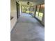 Large screened patio with ceiling fan and expansive windows, perfect for enjoying the outdoors in comfort at 3001 Vivienda Blvd, Bradenton, FL 34207