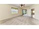 Expansive primary bedroom features a walk-in closet and screened-in patio at 318 Winding Brook Ln # 104, Bradenton, FL 34212
