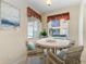 Bright breakfast nook featuring neutral colors and large windows at 318 Winding Brook Ln # 104, Bradenton, FL 34212
