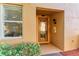 Inviting front door with etched glass and a well-lit entryway at 318 Winding Brook Ln # 104, Bradenton, FL 34212