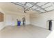 Two car garage with room for storage and overhead lighting at 318 Winding Brook Ln # 104, Bradenton, FL 34212