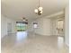 Open floor plan with golf course views and decorative front door at 318 Winding Brook Ln # 104, Bradenton, FL 34212